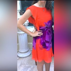 Orange and purple silk dress. High neck front with scoop back.